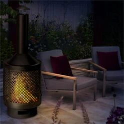 Essos Gartenofen Holzofen Ø45cm Gitterwand Stahlblech Schwarz -Garten Store 10031482 yy 0003 ambient Blumfeldt Essos Gartenofen schwarz